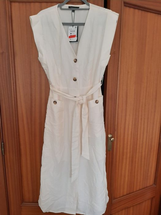 Vestido creme Cortefiel