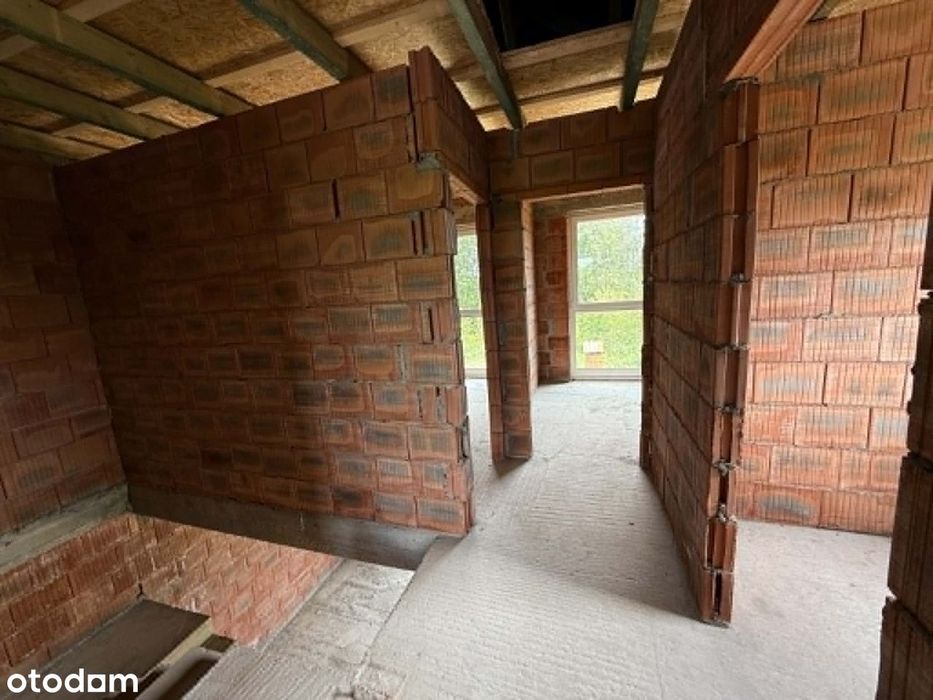 Nowoczesny dom w zabudowie bliźniaczej – 167 m² z garażem i poddaszem.