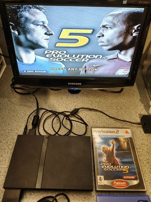 PlayStation 2 + comando + jogos