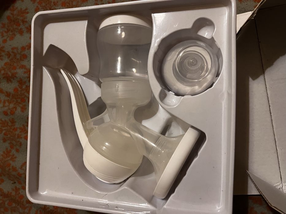 Conjunto bomba de tirar leite materno manual e saquinhos de congelar leite