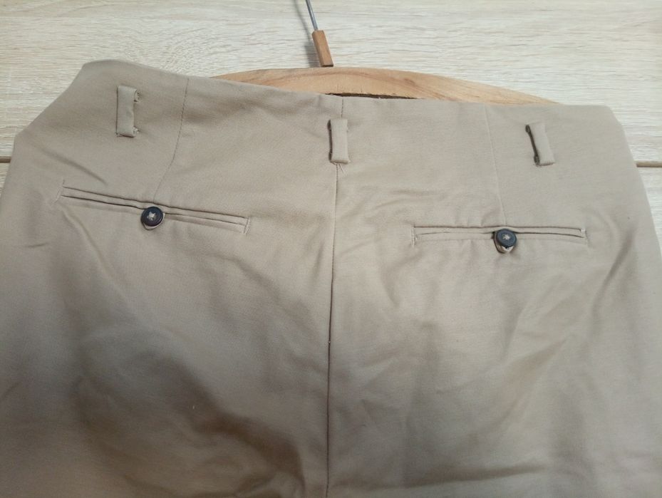 Beżowe spodnie biurowe 38