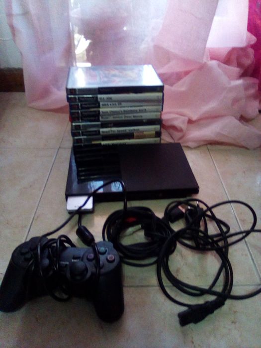 Ps 2  used but in good condition with games64551849034369121