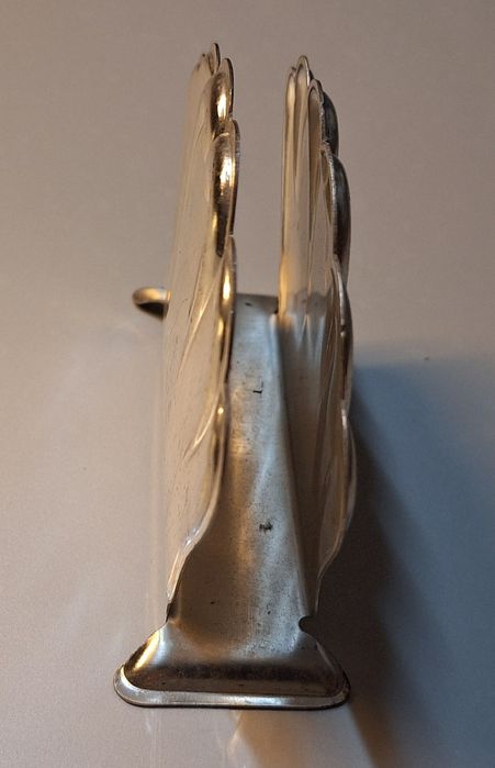 Porta guardanapos em metal.