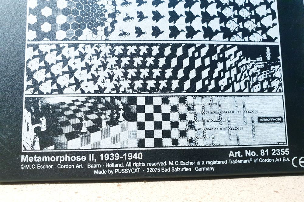 M.C. Escher "Metamorphose" Quebra cabeça deslizante