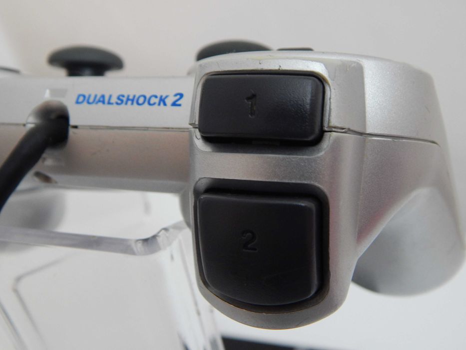 Oryginalny Srebrny Silver kontroler gamepad DualShock 2 do PlayStation 2 Sony stan dobry