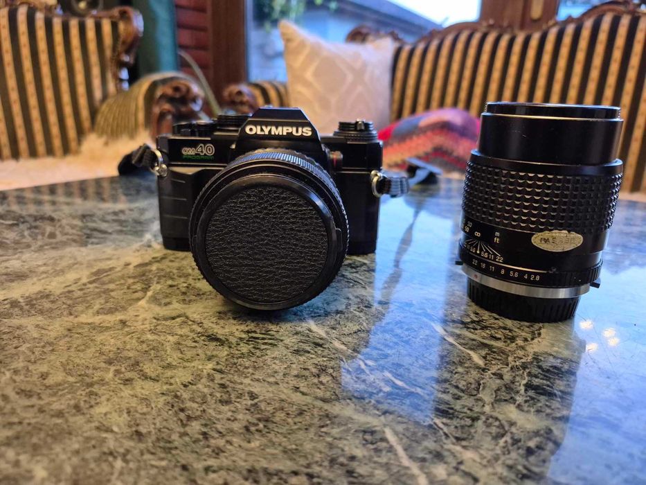 Olympus OM40 Program