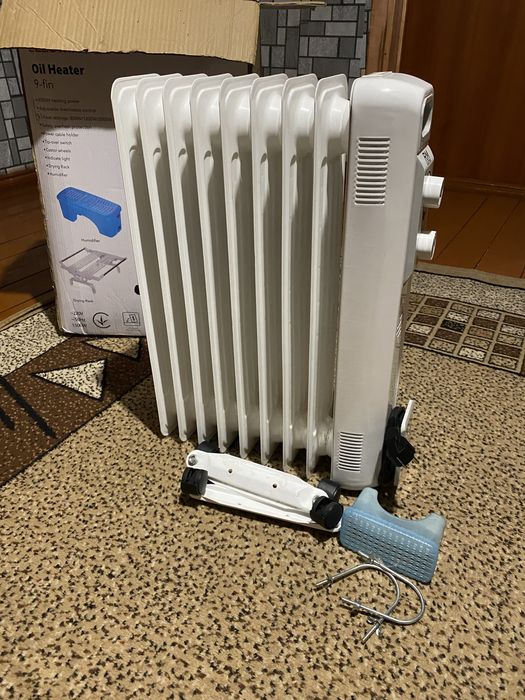 Масляний обігрівач RM-02002E! 9 секцій потужністю 800-1200-2000W