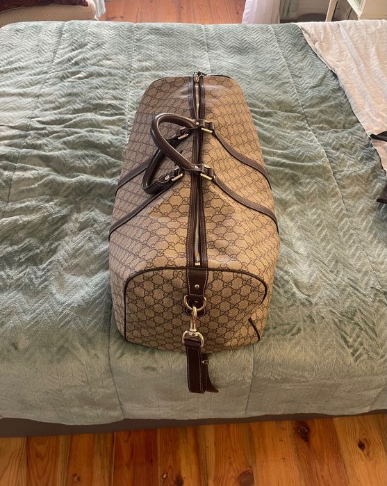 Gucci Travel Bag Monogrammed Coated Canvas
Beige