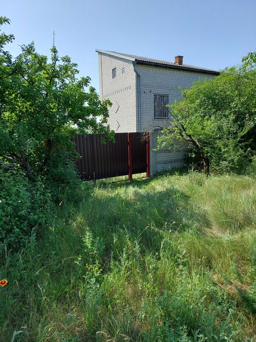 Продам дом с участком в г. Подгородное