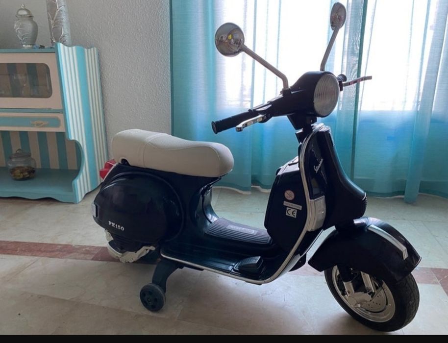 Vespa eletrica criança.