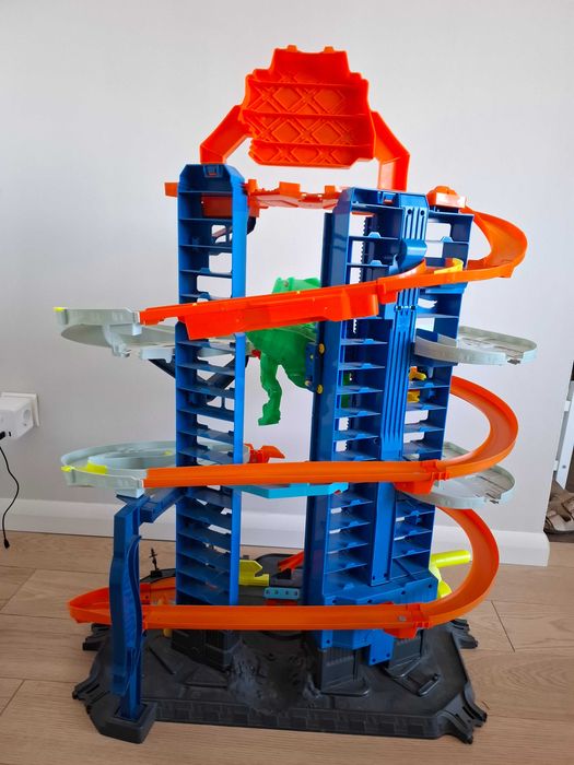 Hot Wheels City GJL14 Mega Garaż Atak Dinozaura T-Rex + gratis