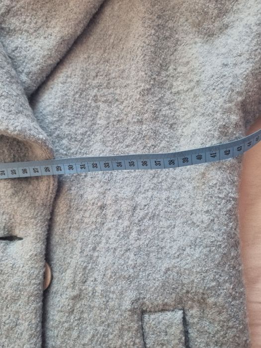 Zimowy płaszcz 140/146