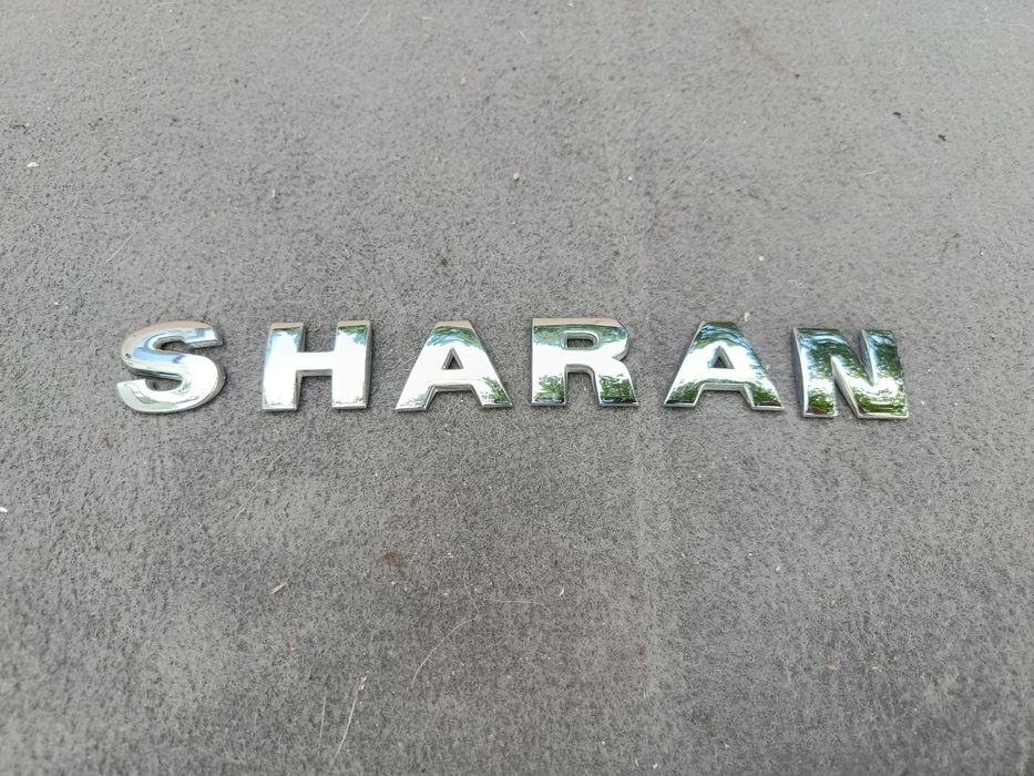 Emblemat znaczek na tylna klapę oryginalny Volkswagen Sharan I MK1 Lift
