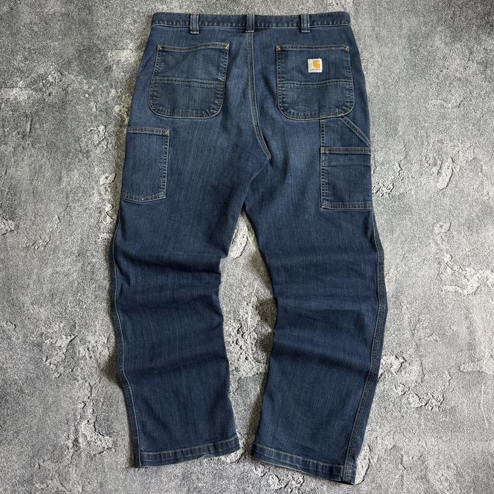 Широкі джинси від carhartt wip double knee у темно синьому кольорі