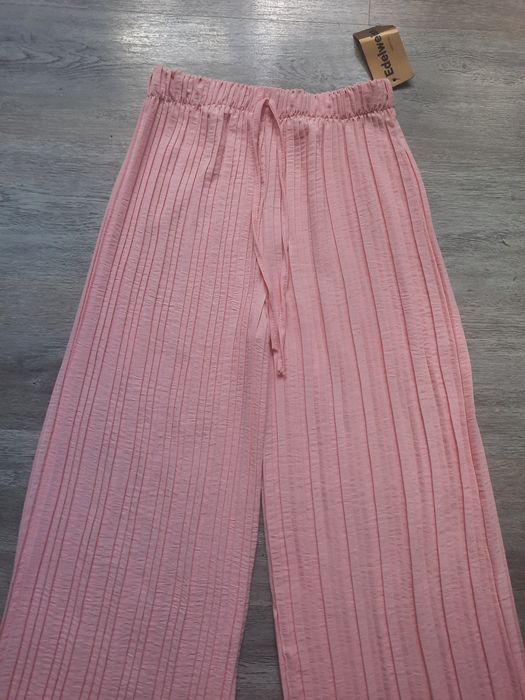 Piękne eleganckie pudrowy róż plisowanych spodni uni.M/4XL