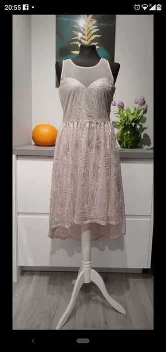 Elegancka sukienka z cekinami Orsay 38