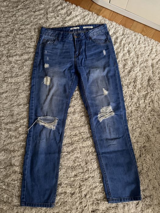 Spodnie jeansy z przetarciami damskie rozm. 34