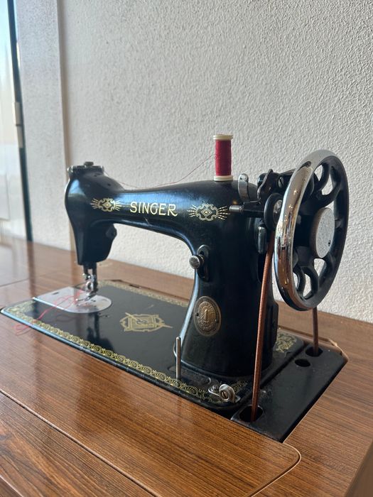 Máquina de costura singer