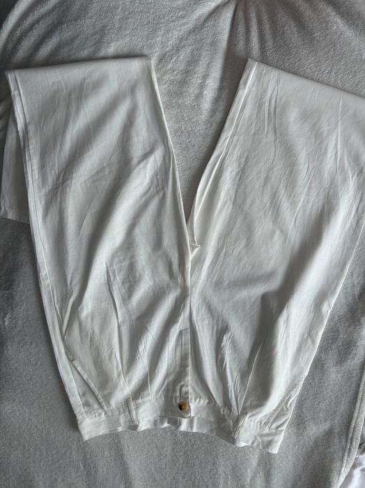 Białe świetne spodnie prosta nogawka L XL 40 len bawełna