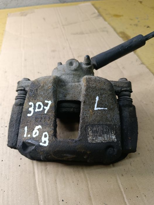 Peugeot 307 1:6 16V 03r- zacisk hamulcowy przedni lewy