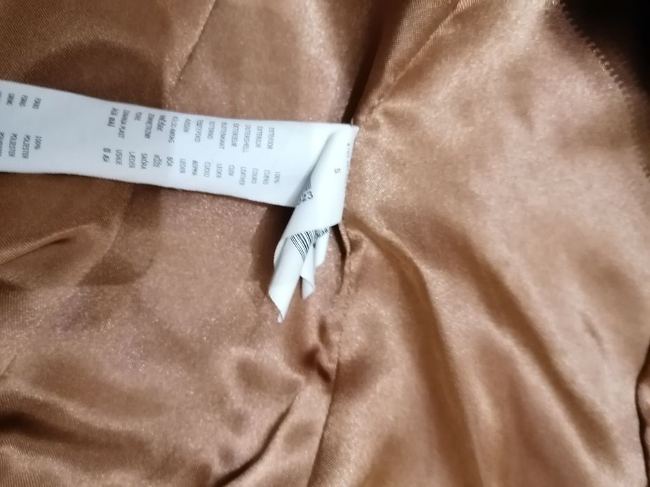 Casaco de mulher, em pele