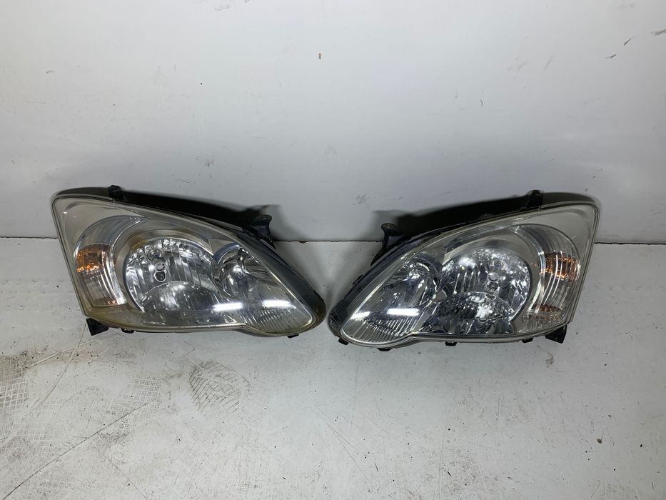 Prawy Lewy reflektor lampa EUROPA lampy przód toyota corolla E12 2006r