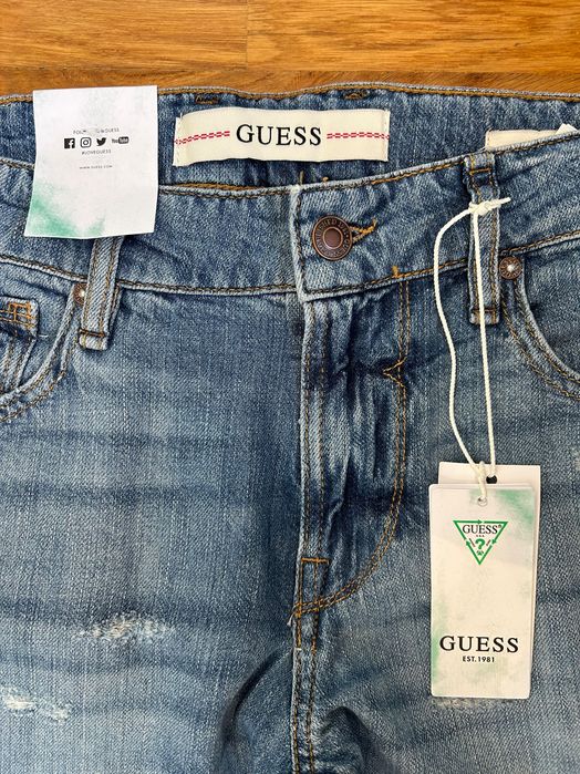Calças GUESS novas com etiqueta e preço de origem