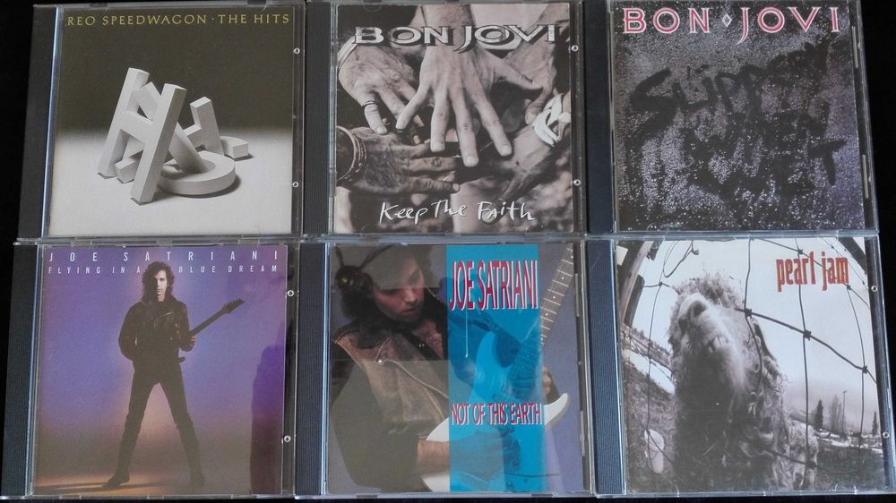 CDs Scorpions, AC/DC, ZZ Top, Bon Jovi, Status Quo e outros
