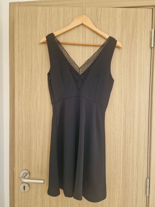 Vestido preto em V