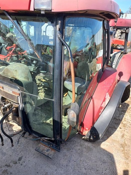 CASE MXU kabina,drzwi,sterownik,licznik,komputer,wiązka elektryczna ,ehr,orbitrol,plastiki,tapicerka,przełączniki,manetka,szyby.błotniki,poszerzenia.82001471,ospc 160 or