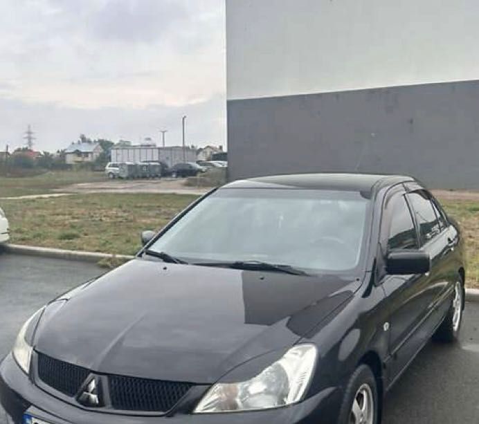 Продам Mitsubishi Lancers 2008, седан чорного кольору , двигун 1,6 газ , пропан Бутан бензин , пробіг 220 , ціна 4000$