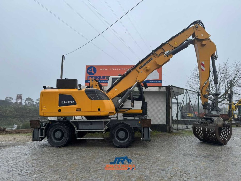 Liebherr LH22M - Giratória com Cabine elevatrória