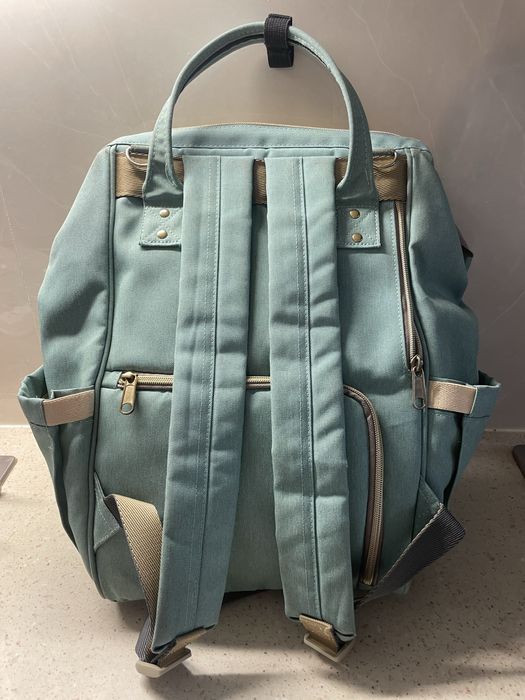 Mochila versátil - muda fraldas como nova!