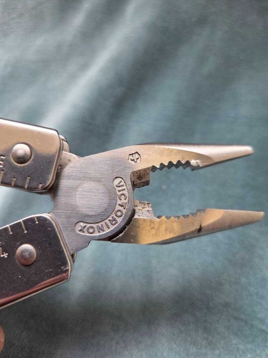 Victorinox SwissTool Plus – multitool, stan idealny, jak nowy
