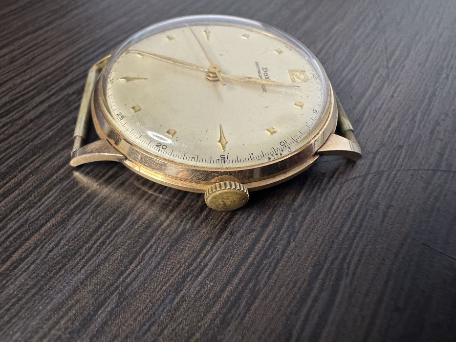 Złoty zegarek Doxa 5277,906  14k 29,15 gr. 585