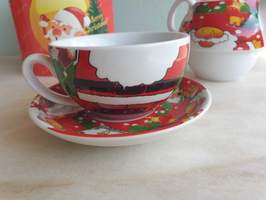 Conjunto de bule e chávena com motivos de Natal