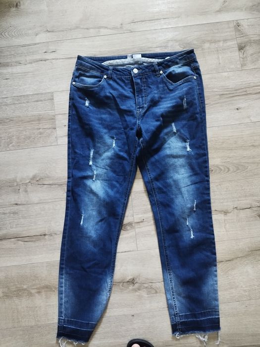 Spodnie jeans 42