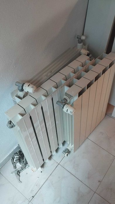 Caldeira a gás natural + aquecedores de parede