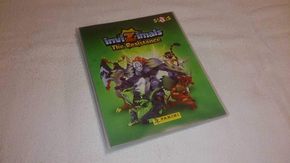 invizimals - the resistance (capa arquivadora com 33 staks)