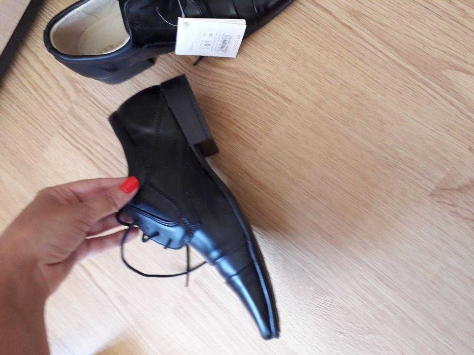 новые кожаные туфли