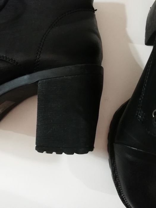Botas pretas salto alto