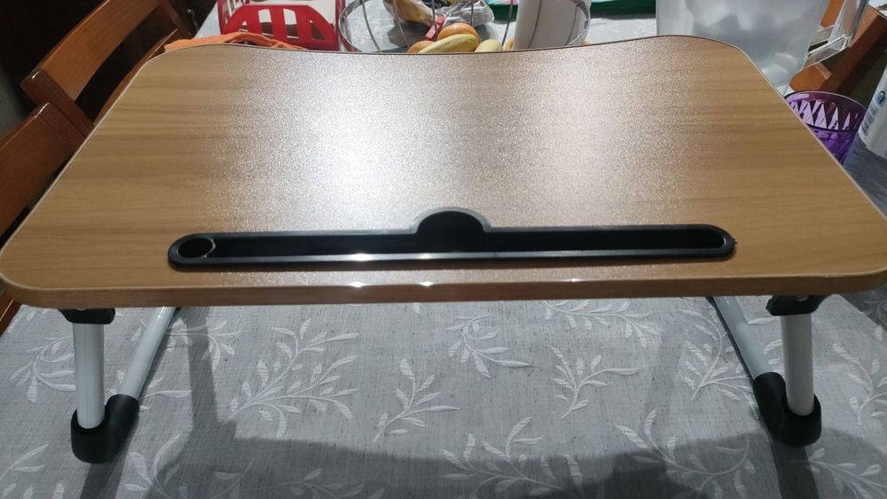Mesa multifuncional dobrável 
Preço fixo 
Tenho várias unidadesnal para Notebook Apoio Cama e Sofá Ideal para Home Office Portátil 
Preço fixo 
Te