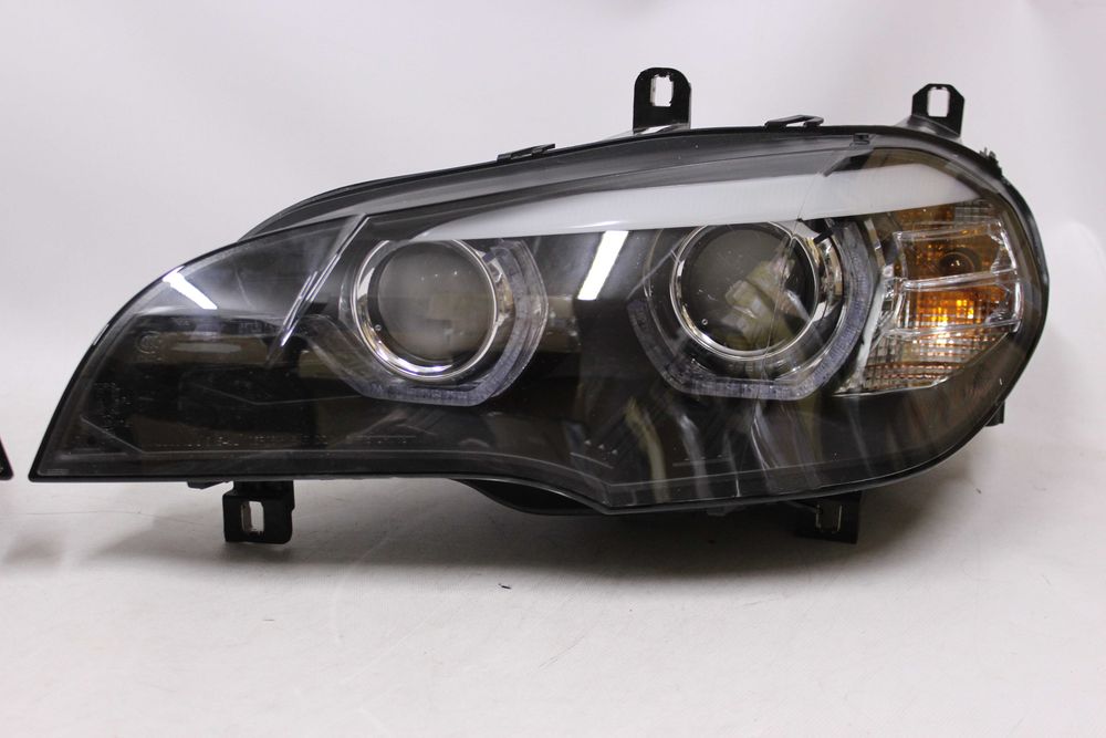 Lampy reflektory przednie przód BMW E70 r.07-10 LED NEON XENON Skrętny
