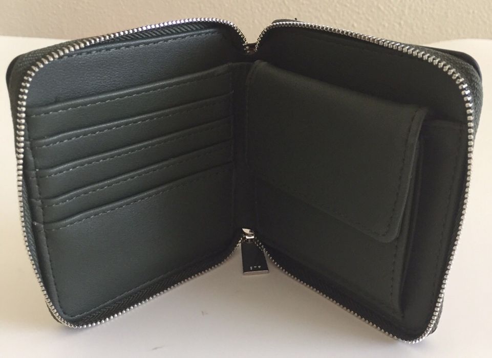 Porta-moedas e notas stradivarius