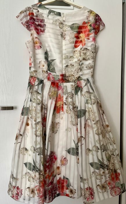 Sukienka wizytowa 44 w kwiaty za kolano