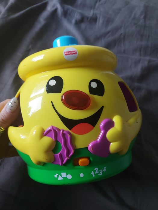 Garnuszek na klocuszek Fisher Price