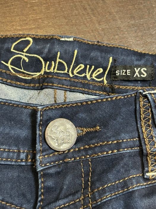 Spodnie jeans damskie XS niebieskie dżins przecierane