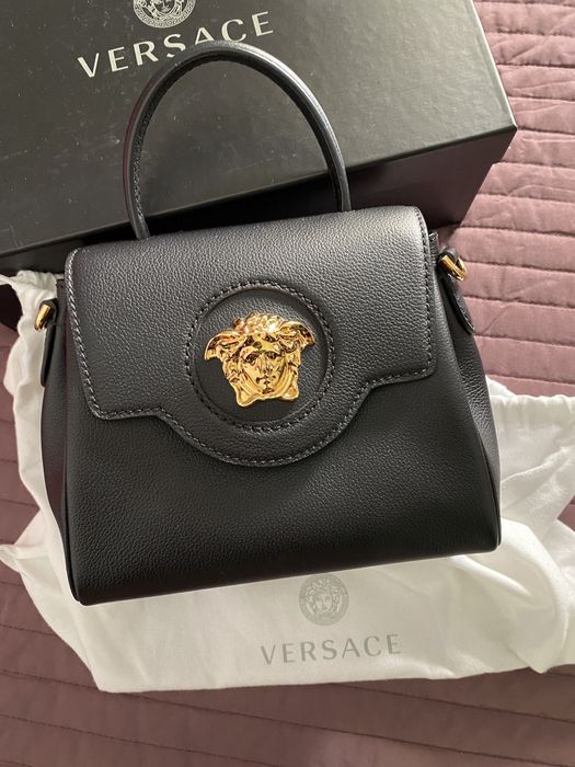 Mala Versace nunca usada. Estou a vender porque preciso de dinheiro!