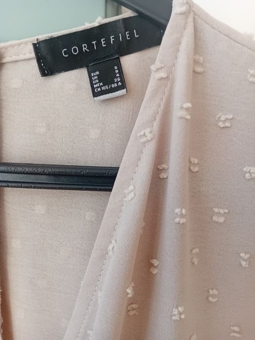 Macacão bege Cortefiel