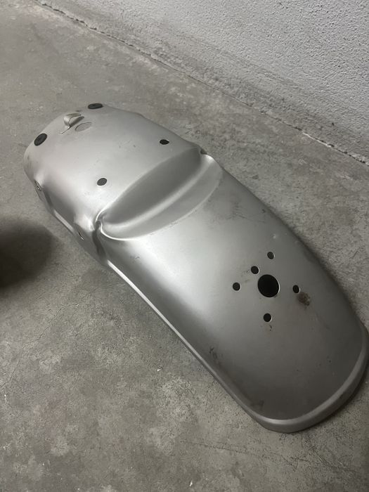 Guarda lamas para mota